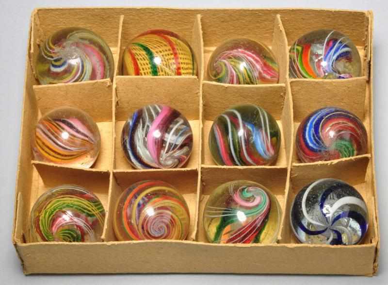 Appraisal: Rare Box Set of German Swirl Marbles Description Box of