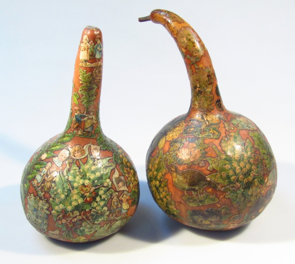 Appraisal: Two matched thC gourdes each of typical form decorated with