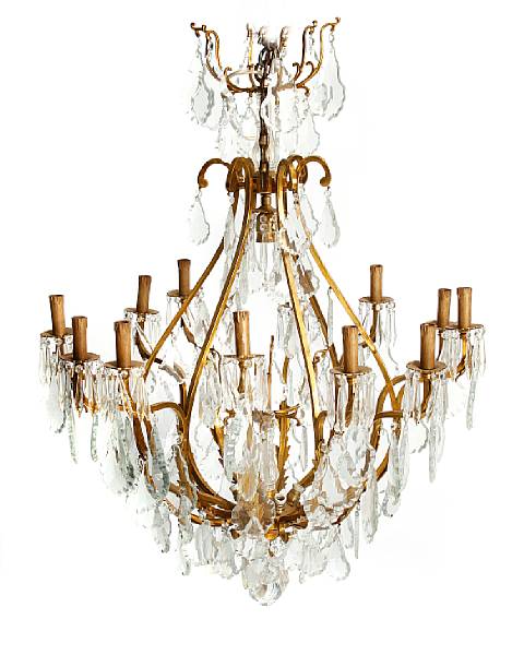 Appraisal: A Louis XV style bronze and crystal thirteen light chandelier