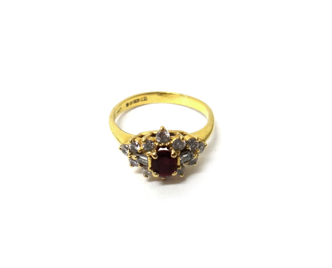 Appraisal: An ct gold ruby and diamond set cluster ring claw