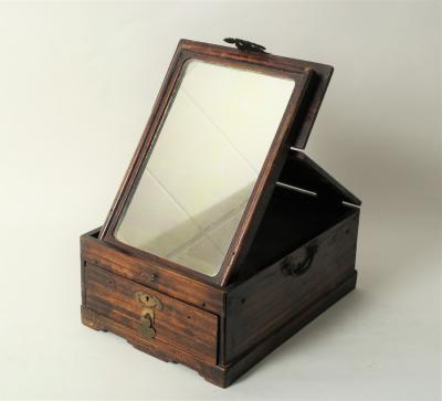 Appraisal: A Chinese hardwood shaving stand with mirror to the hinged