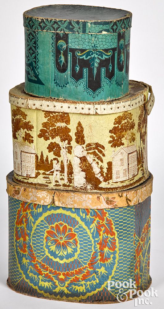 Appraisal: Three wallpaper hat boxes mid th c Three wallpaper hat