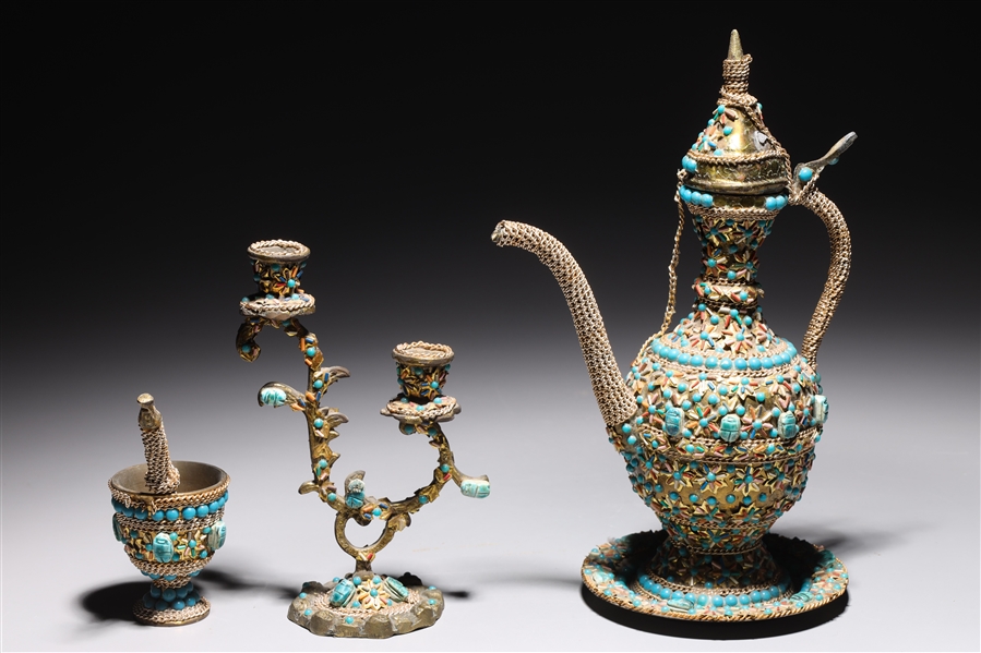 Appraisal: Group of decorative Middle Eastern objects including teapot candle holder