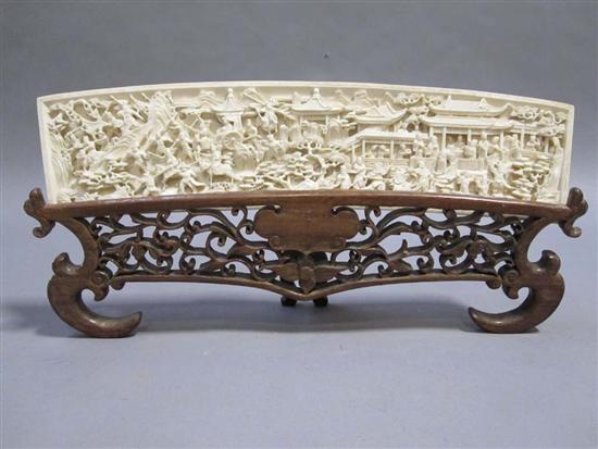 Appraisal: CHINESE RELIEF CARVED IVORY PLAQUE th C Depicting royalty attendants