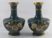 Appraisal: A pair of fine brass cloisonne shaded enamelled vases with