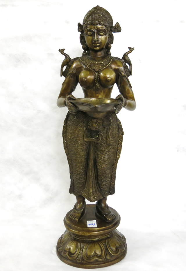 Appraisal: INDIA BRONZE GODDESS STATUE the topless female figure holding a