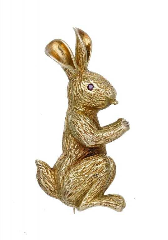 Appraisal: A BOUCHERON CT GOLD RABBIT BROOCH with ruby eye signed