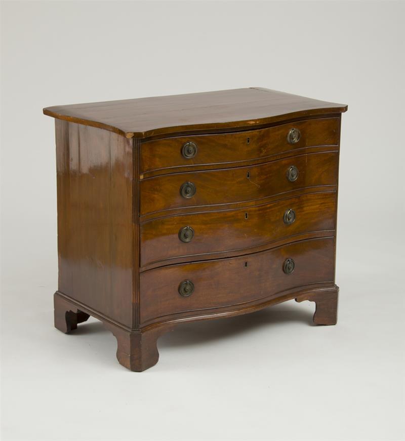 Appraisal: GEORGE III MAHOGANY SERPENTINE-FRONTED CHEST OF DRAWERS The overhanging serpentine-fronted