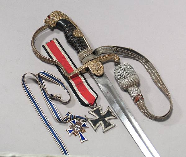 Appraisal: A Third Reich officer's sword and two period decorations Comprising