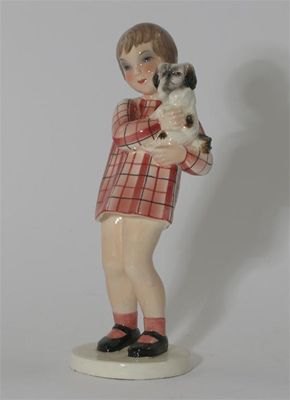 Appraisal: A Goldscheider Pottery figure of a girl holding a Pekinese