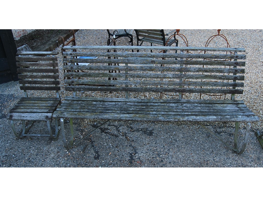 Appraisal: A slatted garden seat on wrought iron frame and two