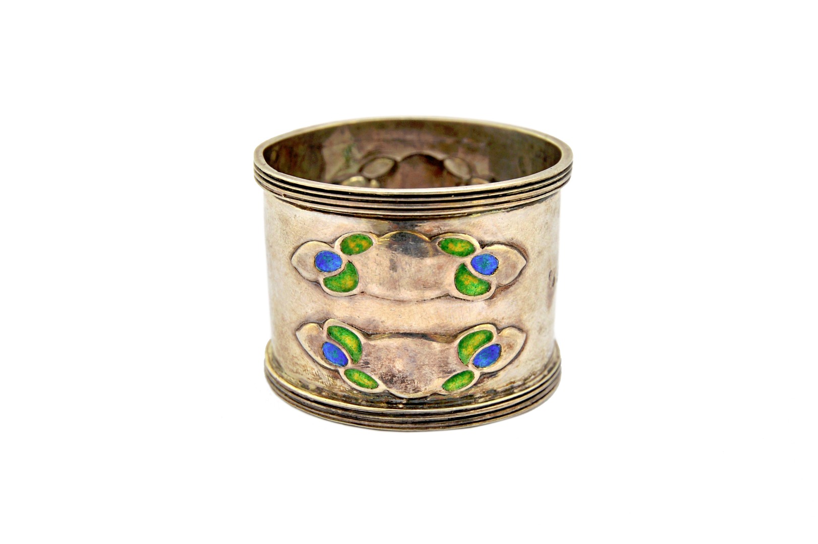 Appraisal: A silver and enamelled Art Nouveau napkin ring decorated with