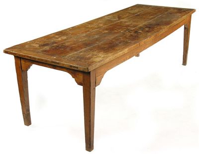 Appraisal: A George III elm farmhouse kitchen table the triple planked