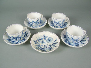 Appraisal: Four Meissen 'Onion' pattern cups and five saucers with typical