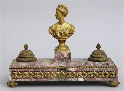 Appraisal: LOUIS XVI-STYLE GILT-BRONZE MOUNTED FLEUR DE PECHE MARBLE ENCRIER Centered