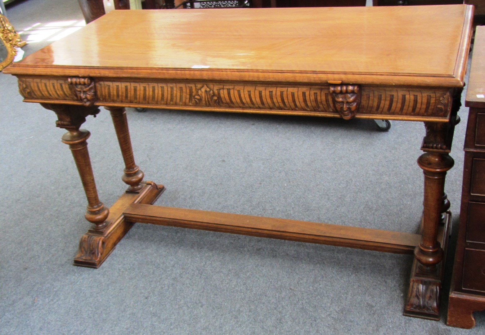 Appraisal: A Victorian walnut rectangular centre table with gadrooned edge on