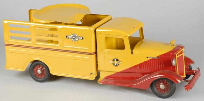 Appraisal: Pressed Steel Buddy L Yellow International Truck Description Circa Ride