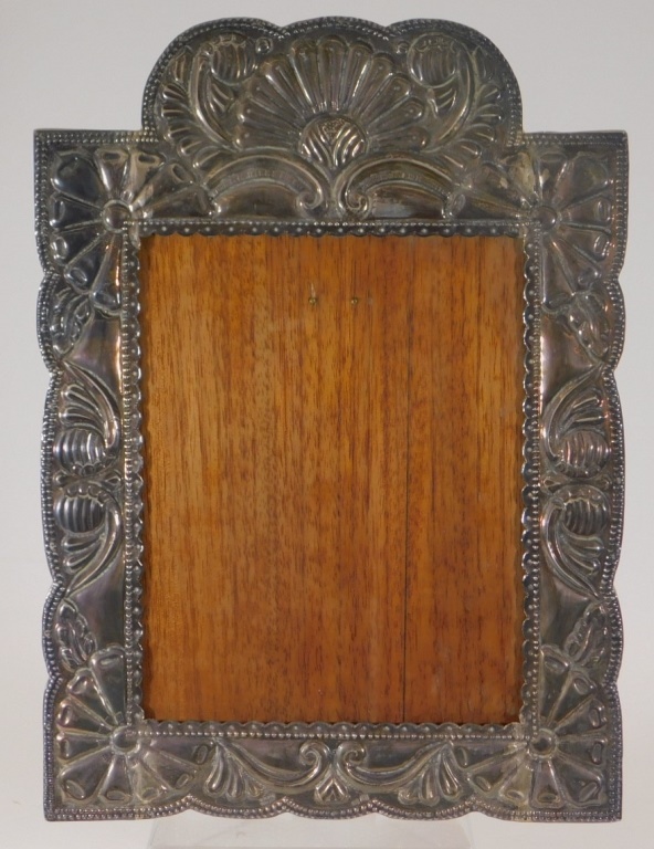 Appraisal: VICTORIAN STERLING SILVER REPOUSSE PICTURE FRAME United States C Decorated