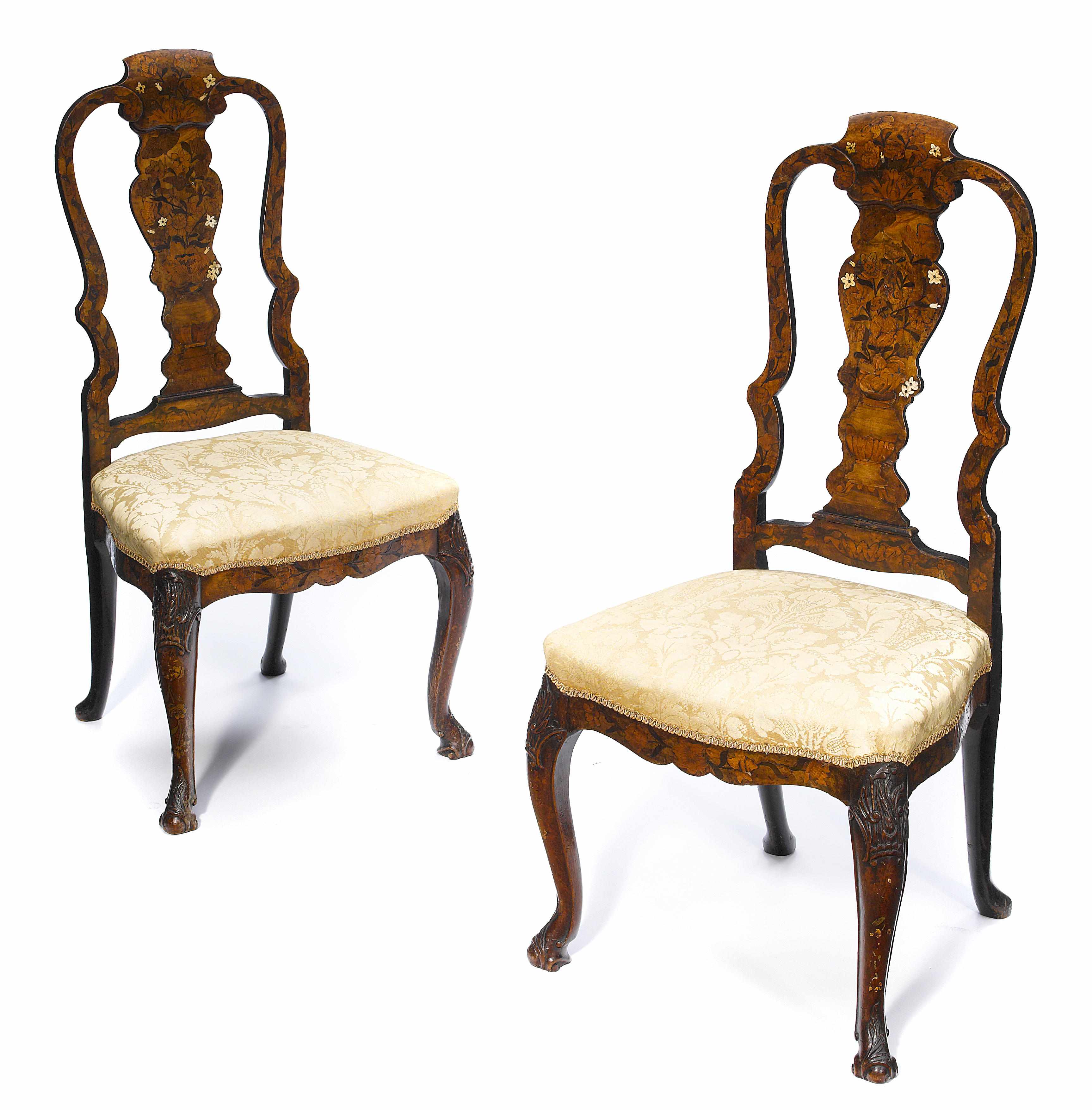 Appraisal: A pair of George II marquetry inlaid walnut side chairs