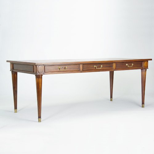 Appraisal: ALEJANDRO BUSTILLO COMTE LTDA Mahogany bureau plat c with inset