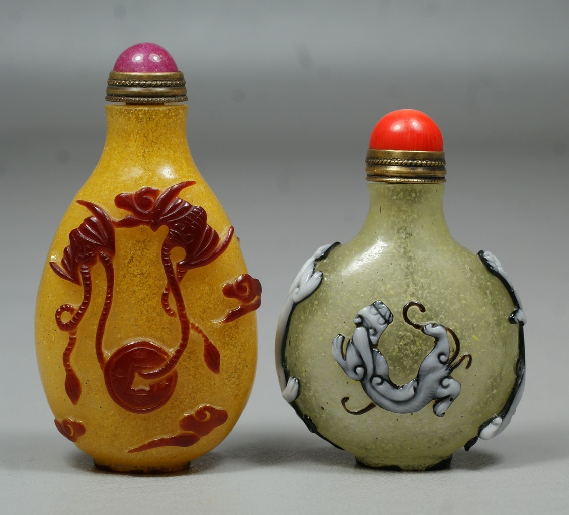 Appraisal: Chinese snuff bottles carved Peking glass red birds and bees