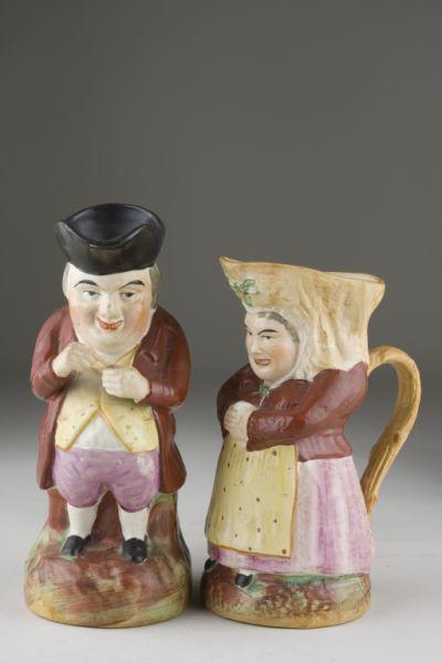 Appraisal: Two th c Staffordshire Toby Mugs the first a gentleman