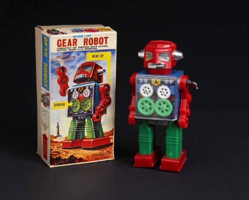 Appraisal: Plastic Tin Gear Robot Description Japanese Made by SH Working