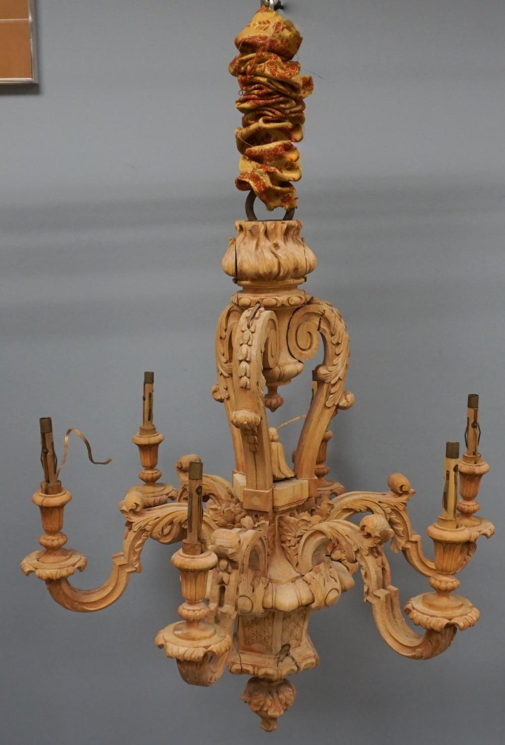 Appraisal: BAROQUE STYLE CARVED WOOD SIX-LIGHT CHANDELIER X IN X CM