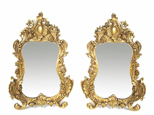 Appraisal: A pair of small Louis XV style bronze mirrors height