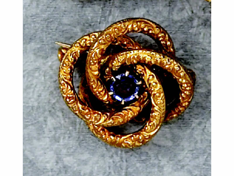 Appraisal: SAPPHIRE BROOCH k gold with multi-swirl design set with one