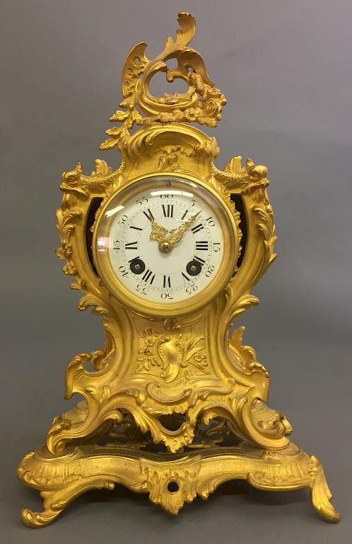 Appraisal: French Fire Gilt Metal Shelf Clock French fire gilt metal