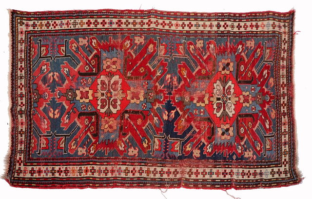 Appraisal: A KASAK SUNBURST RUG with all over polychrome geometric medallion