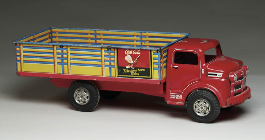 Appraisal: MARX LITHOGRAPHED COCA-COLA STAKE BODIED DELIVERY TRUCK Brightly lithographed in