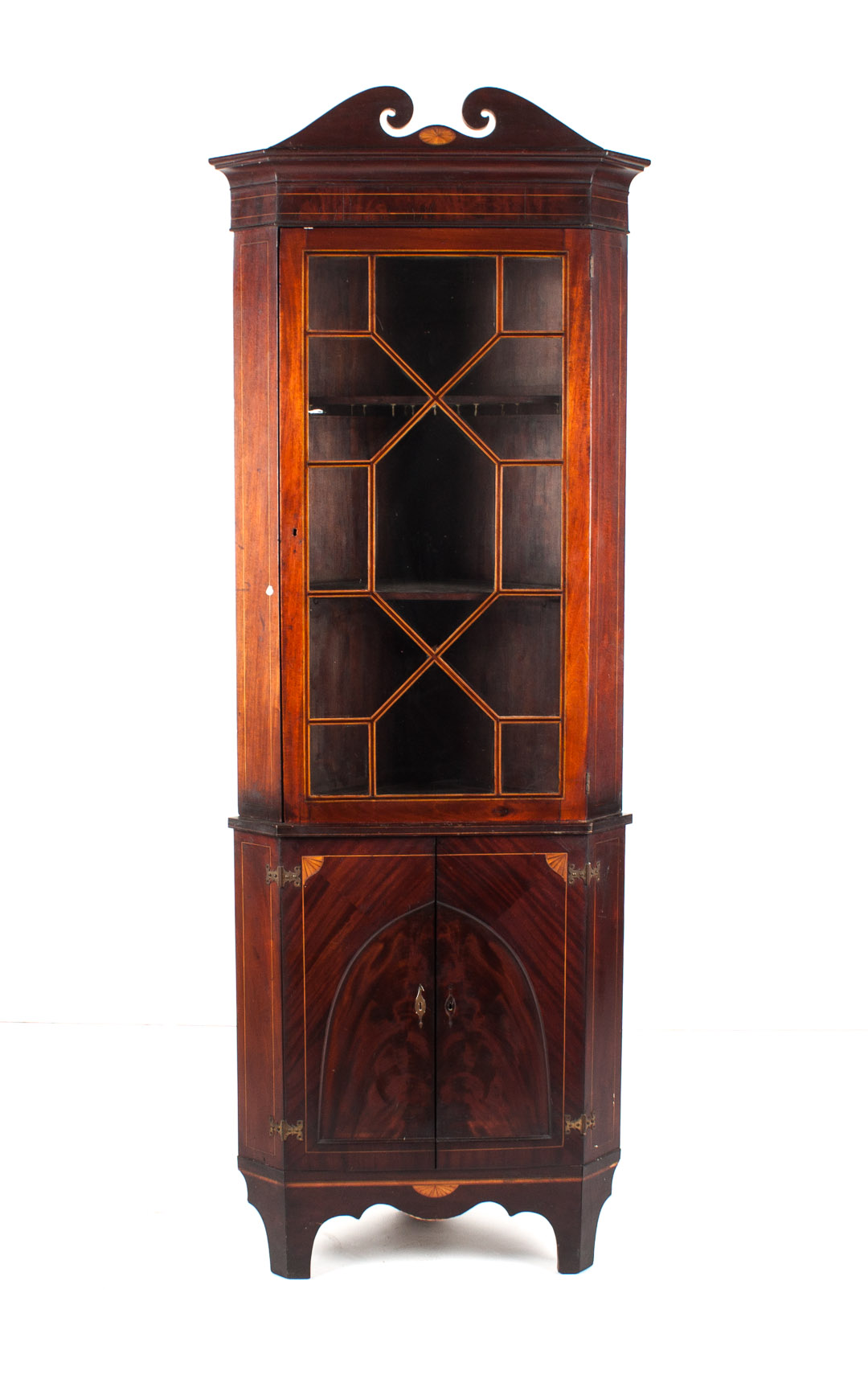 Appraisal: George III style mahogany corner cupboard circa stringer patera and