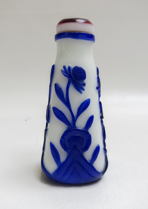 Appraisal: CHINESE PEKING GLASS SNUFF BOTTLE blue cut to white tapering