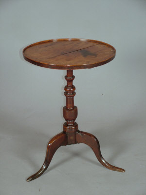 Appraisal: A George III fruitwood and yew wood tripod table with