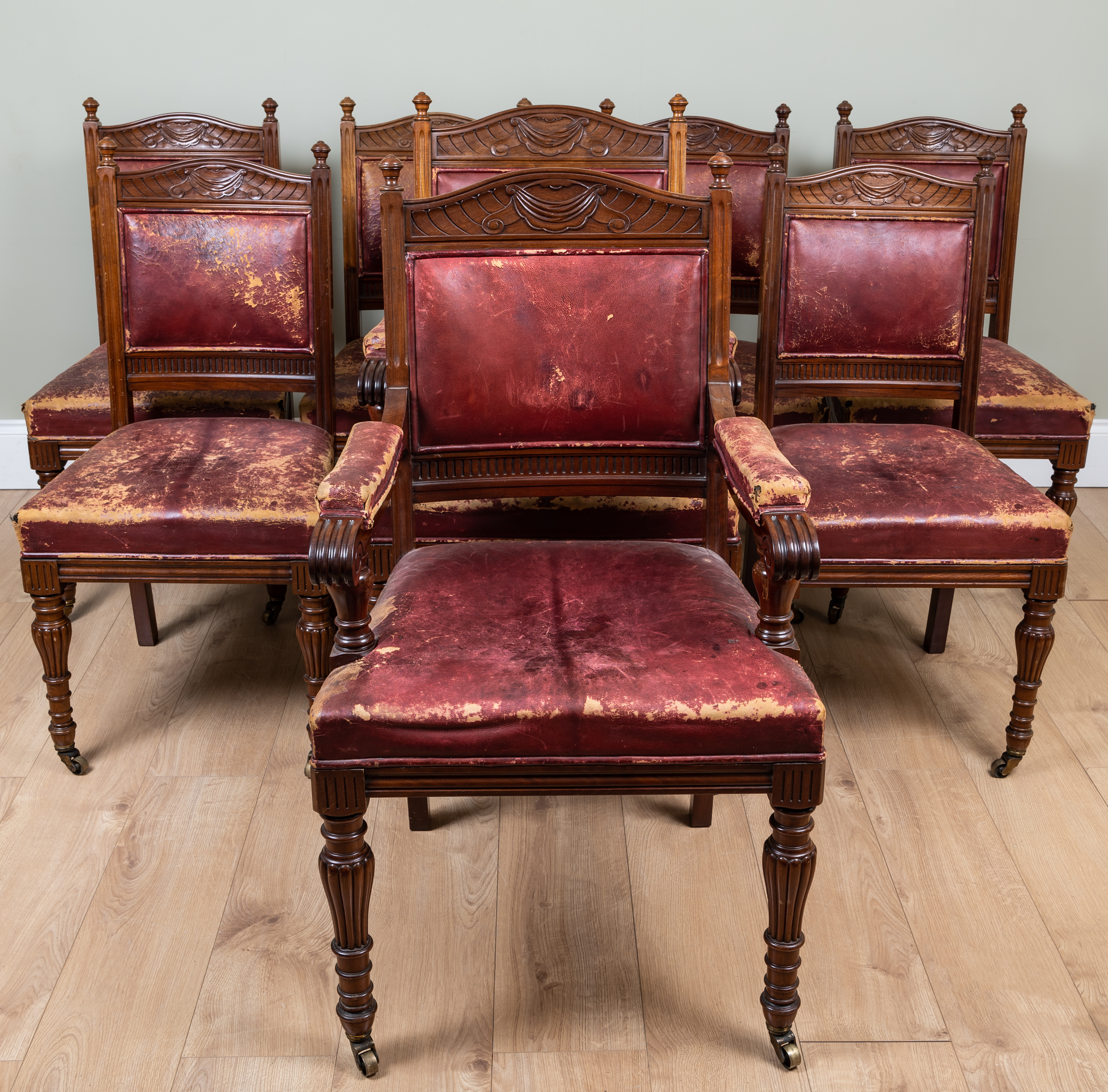 Appraisal: A set of eight Victorian walnut dining chairs with carved