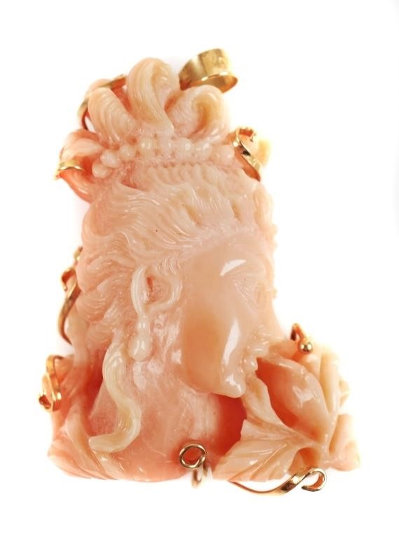 Appraisal: ANTIQUE CHINESE CORAL BUST PENDANT K GOLDVintage carved coral pendant