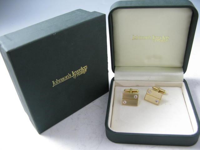 Appraisal: KT Gold Diamond Cufflinks with four round diamonds approximate total