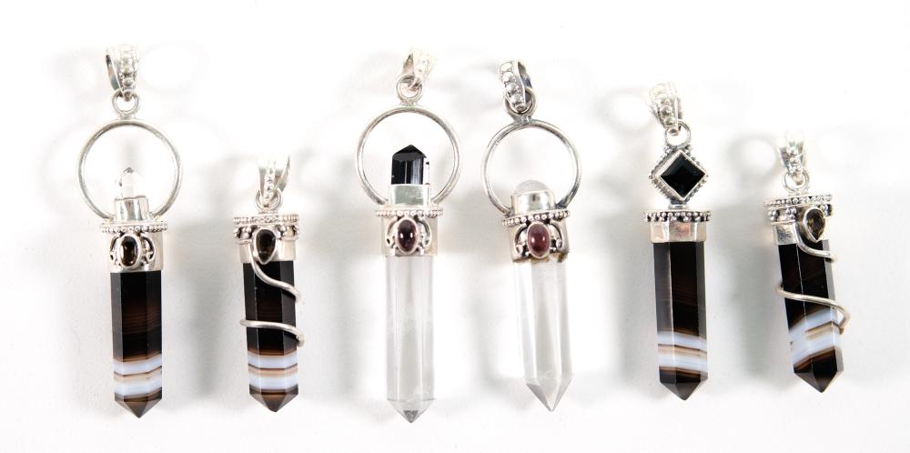 Appraisal: Group of sterling quartz and multi stone point pendants comprising