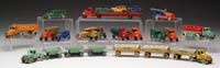 Appraisal: FOURTEEN TOOTSIE TOY VEHICLES Two dairy trucks with white rubber