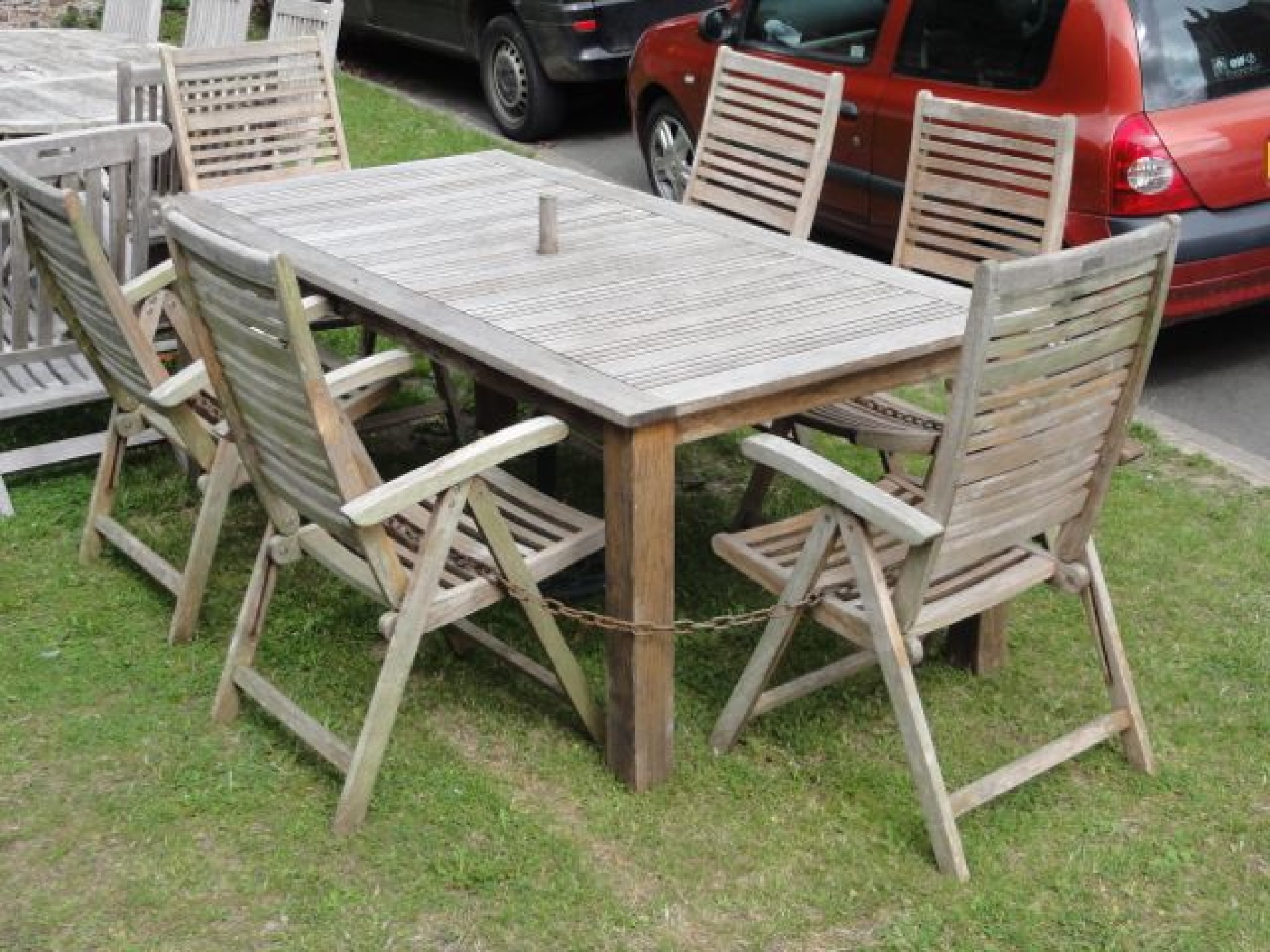 Appraisal: A Laura Ashley Outdoor Living contemporary weathered teak garden table