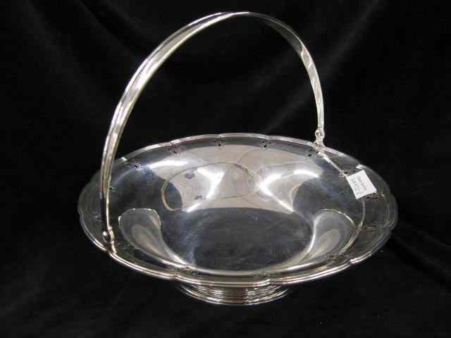 Appraisal: Tiffany Sterling Silver Basket '' diameter swing handle openwork acanthus