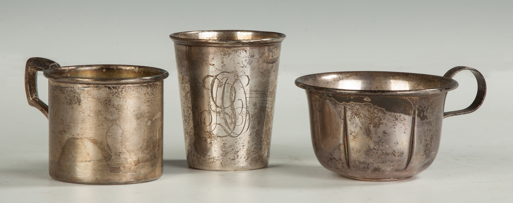 Appraisal: Three Silver Cups L to R unmarked Gorham sterling monogrammed