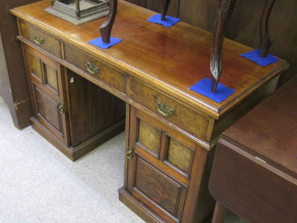 Appraisal: Edwardian mahogany and walnut veneered twin pedestal writing desk