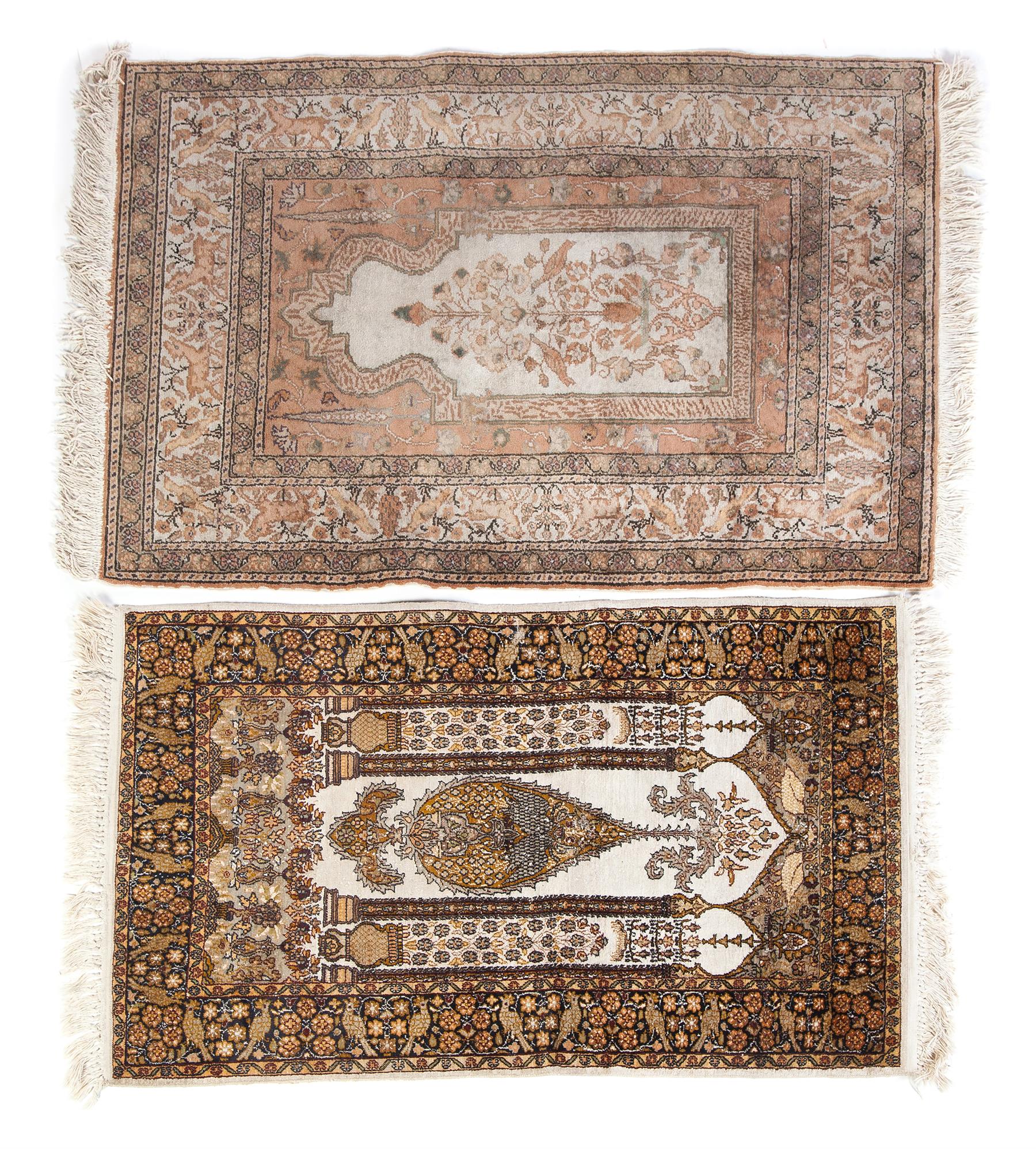 Appraisal: TWO ORIENTAL PRAYER RUGS Twentieth century Silk with floral border