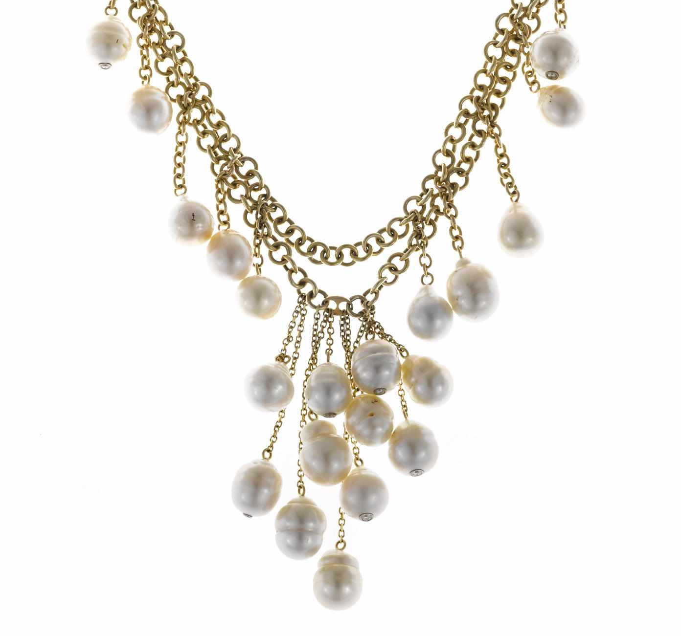 Appraisal: A baroque cultured pearl and diamond fringe necklace composed of