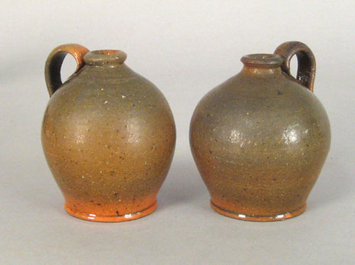 Appraisal: Matched pair of miniature redware jugs th c h