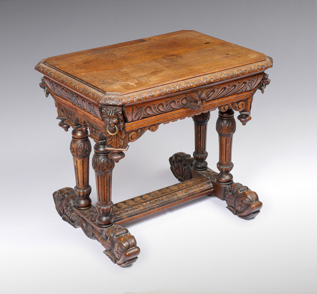 Appraisal: HEAVILY CARVED OAK FIGURAL TABLE Extensively carved oak single drawer