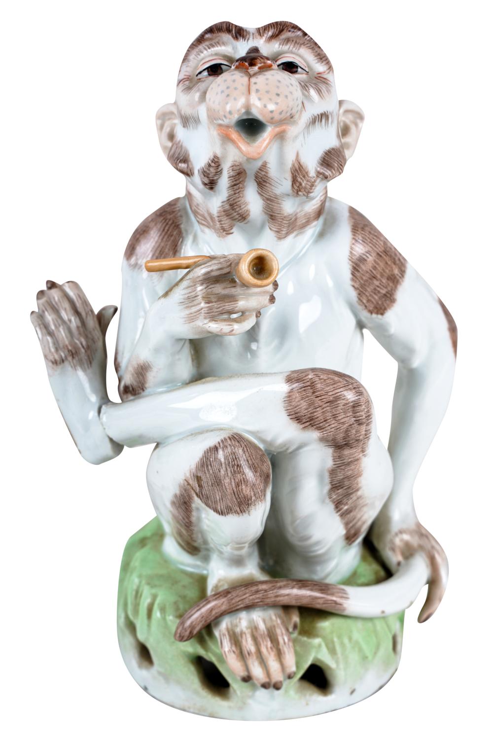 Appraisal: DRESDEN PORCELAIN MONKEY FIGURECondition left foot broken repaired under glazed